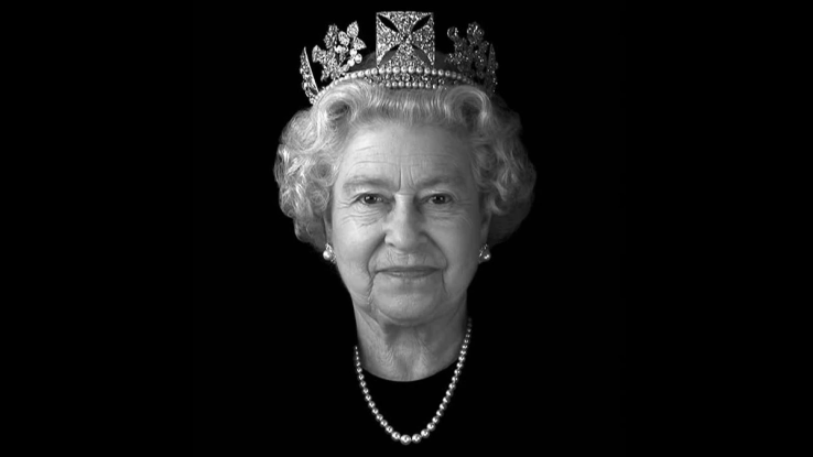 Queen Elizabeth is captured giving a rare smirk in a never-before-seen portrait from 2004.