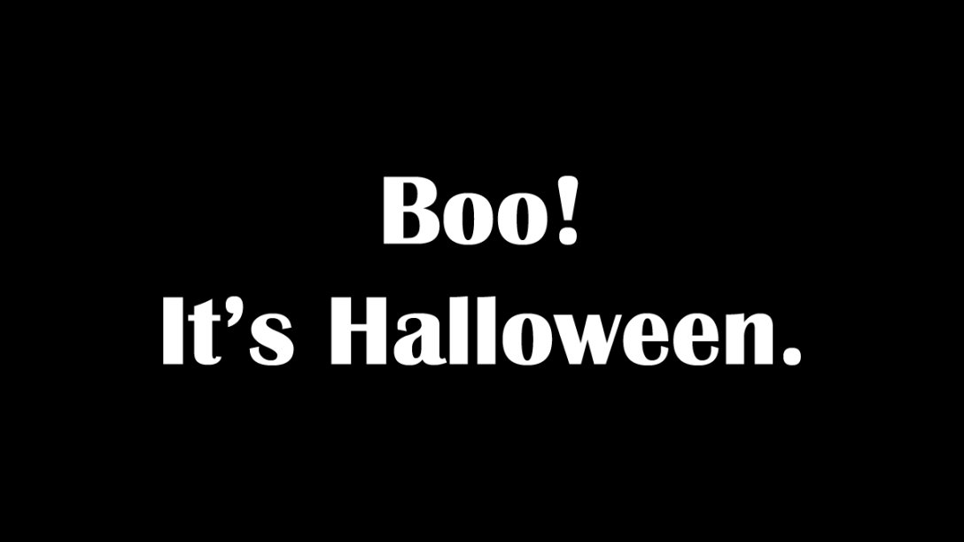 Boo! It's Halloween. White lettering on black background. Header.