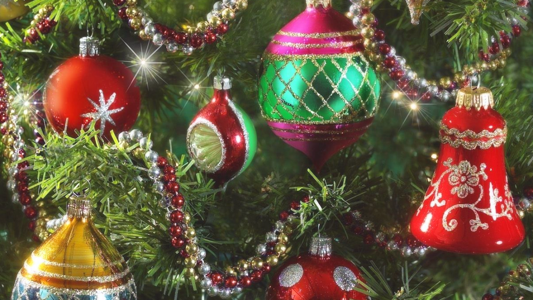 Christmas tree with colorful ornaments and more. Close up.